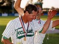 Don Fields, then manager of the Tecumseh Green Giants, is doused with champagne by a teammate in 1992. Fields passed away on Dec. 31, 2016, at the age of 70.