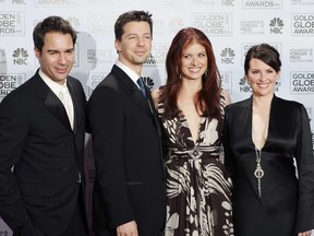 In this Jan. 16, 2006 photo, cast members from the comedy series Will & Grace, Eric McCormack, left, Sean Hayes, Debra Messing and Megan Mullally, pose backstage after making an award presentation at the 63rd Annual Golden Globe Awards in Beverly Hills, Calif. Will & Grace will make a comeback on NBC with 10 new episodes of the hit comedy to air during the 2017-18 season.