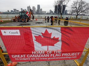 Construction crews prepare to dig following a ground breaking for the Great Canadian Flag Project at the foot of Ouellette Avenue in Windsor on Wednesday, January 25, 2017. Construction has started on the flag pole ground work while rise 45 metres into the air.