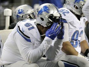 Detroit Lions defensive end Kerry Hyder sits on the bench at the end of the second half of their NFC wild card playoff game against the Seattle Seahawks Jan. 7, 2017, in Seattle. The Seahawks beat the Lions 26-6.