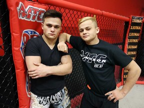 Windsor MMA fighters T.J. Laramie (left) and his brother Tony (right) stand in the cage at Maximum Training Centre on Jan. 16, 2017. The two brothers both won bouts at the TKO 37 event in Montreal on Jan. 13.