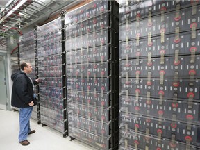 Managed Network Systems, Inc. president and owner Clayton Zekelman is shown among the company's battery backup room in the networking systems facility in Windsor on Monday, December 19, 2016.