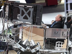 Detroit Mayor Mike Duggan tries out a driving simulator in the Ford exhibit area during his sneak peek of the North American International Auto Show at Cobo Center in Detroit on Jan. 6, 2017. The press preview begins on Sunday, Jan. 8. The show is opened to the public on Jan. 14-22.