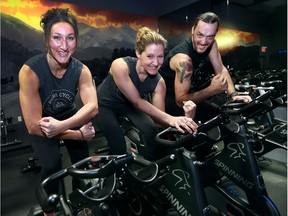 Julia Zeising, left, Tamara Boland and Dan Boland of Pure Cycle in Windsor are shown at the studio on Jan. 12, 2017. The group is pumped up to host a spin cycle fundraising event for the Transition to Betterness organization.