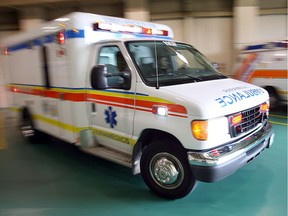 An ambulance speeds out of the downtown station on Aug. 24, 2006.