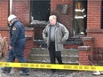 In this Jan. 25, 2006, file photo, rooming house landlord Hilary Payne, right, and fire prevention officer Richard Marr are shown at the scene of a fire at 614 Mill St. in Olde Sandwich.