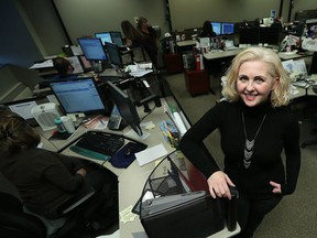 Jennifer Tanner is photographed inside the 311/211 call centre in Windsor on Jan. 5, 2017. 211 offers around the clock service to help connect people with non profits and government services.