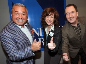 Goran Todorovic, left, Holly Ward and Sean P. McCann give a thumbs up after learning they're finalists in the Professional of the Year category of the Windsor-Essex Regional Chamber of Commerce 27th annual Business Excellence Awards during a news conference at Windsor Star News Cafe Soup Market on Jan. 10, 2017.