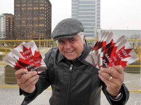 Great Canadian Flag Project booster Peter Hrastovec is photographed at the foot of Ouellette Avenue at Dieppe Park on Jan. 13, 2017 where fencing has been installed to mark the start of construction of massive flag.