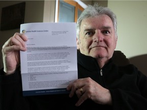 Jim McKenzie holds a letter from the London Health Sciences Centre on Jan. 13, 2017, notifying him of a very low risk of infection for open heart surgeries.  McKenzie had open heart surgery a few years back and is worried about this risk.