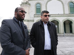 Windsor Islamic Council vice-chair Abdullahi Cisman, left, and Windsor Islamic Council chairman Dr. Maher El-Masri speak with media outside the Windsor Mosque on Jan. 30, 2017.