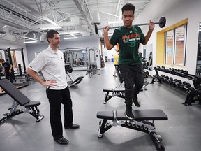 Nicholaus Hardcastle, 12, works out at the Windsor YMCA at Central Park Athletics on Jan. 5, 2017, under the guidance of Mike McMahon, health and wellness manager, at the facility.