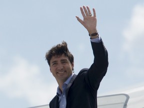Canadian Prime Minister Justin Trudeau boards the government plane as he departs for Poland and Ukraine July 7, 2016, in Ottawa.    (file photo)