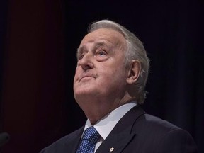 Former prime minister Brian Mulroney pauses while speaking following the announcement of the $60 million Brian Mulroney Institute of Government and Mulroney Hall at St. Francis Xavier University in Antigonish, N.S. on Wednesday, October 26, 2016. Mulroney says the federal government may face a &ampquot;rough negotiation&ampquot; when it comes to NAFTA, but he believes Canada will nonetheless emerge with strong ties to the U.S. and Mexico.THE CANADIAN PRESS/Darren Calabrese
