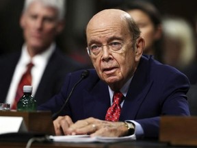 FILE - In this Jan. 18, 2017, file photo, Commerce Secretary nominee Wilbur Ross testifies on Capitol Hill in Washington, at his confirmation hearing before the Senate Commerce Committee. Ross is headed toward confirmation as Commerce Secretary in President Donald Trump‚Äôs administration. The Senate is set to vote on Ross‚Äô nomination on Feb. 27. Ross easily cleared the Senate Commerce Committee and a procedural vote by the full Senate. (AP Photo/Manuel Balce Ceneta, File)