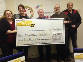 Members of CUPE Local 27 donate $3,500 to the local chapter of Autism Ontario.