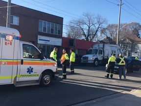 Paramedics work the scene of an two-vehicle accident at Wyandotte Street West and Church Street on Feb. 14, 2017. Windsor police say the accident is being investigated as a hit and run.