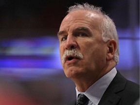 Head coach Joel Quenneville of the Chicago Blackhawks gives instructions to his team during a game against the Carolina Hurricanes at the United Center on Jan. 6, 2017 in Chicago, Ill.
