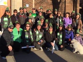 Mandy Furtado, top left, says last year's team from TD Canada Trust was too warm in their winter gear for the mild temperatures. This year's Coldest Night of the Year walkathon is expected to be cooler.