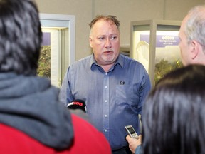 Essex County Library Board chair Richard Meloche speaks with media following a meeting where the library board ratified a new contract for librarians February 10, 2017.