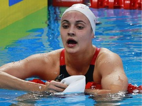 Kylie Masse catches her breath after qualifying for the 100-metre backstroke finals during the 2016 FINA World Swimming Championships on Dec. 6, 2016 at the WFCU Centre. The LaSalle swimmer was named the OUA female swimmer of the year for the third straight year on Feb. 13, 2017.