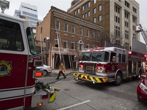 In this Feb. 12, 2017, file photo, Windsor fire crews are shown at the scene of a fire at 52 Chatham St. W., formerly the Pour House pub.