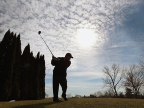 Chris Lucas tees off at the Orchard View Golf Club in Ruthven on Friday, Feb. 17, 2017. Unseasonably warm weather brought out several diehard golfers.