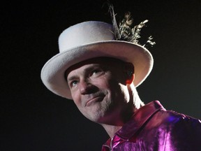 The Tragically Hip's Gord Downie performs during the first stop of the Man Machine Poem Tour at the Save-On-Foods Memorial Centre in Victoria, B.C., on July 22, 2016.