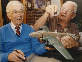 In this April 9, 1992 file photo, Al Perry, right, shows where he and pilot Norman Harper flew together.