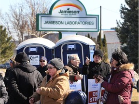 Striking Jamieson Laboratories employees are shown in front of the company's Rhodes Drive office on Monday, February 27, 2017.