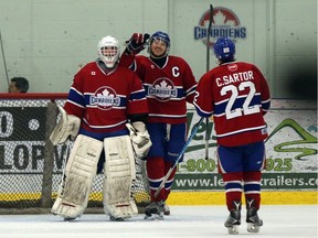 Lakeshore Canadiens goaltender Colin Tetreault is congratulated by teammates after Lakeshore defeated the Blenheim Blades 8-4 in Game 5 of the Provincial Junior Hockey League Stobbs Division semi-final playoffs at the Atlas Tube Centre in Lakeshore on Feb. 28, 2017. Lakeshore leads the best-of-seven series 3-2. Game 6 is Thursday in Blenheim at 7 p.m.
