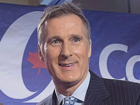 Maxime Bernier leaves the Conservative leadership candidates' bilingual debate in Moncton, N.B., on Dec. 6, 2016.