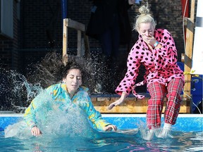 Two brave girls participate in the annual Polar Plunge at the St. Clair College in Windsor on Feb. 2, 2017.