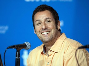 In this Sept. 6, 2014 photo, actor Adam Sander smiles during a news conference for Men, Women, and Children at the 2014 Toronto International Film Festival in Toronto.