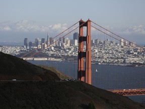 This Oct. 28, 2015, photo shows the Golden Gate Bridge and San Francisco skyline from the Marin Headlands above Sausalito, Calif. The Golden Gate Bridge is only 2.7 kilometres long, but its appeal spans the world.