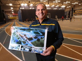 Michael Khan, dean of human kinetics at the University of Windsor, is shown displaying a proposed recreation complex at the St. Denis Centre on Dec. 3, 2015.