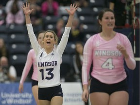 Windsor's Holly Clarke celebrates a point during OUA women's volleyball between the Windsor Lancers and the Nipissing Lakers at the St. Denis Centre on Feb. 6, 2016.
