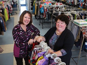 Sue Demers, left, who founded the Wee Ones consignment shop 40 years ago, and owner Theresa Russell talk about the generations of families they've served at the store.