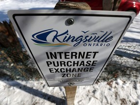 A sign marks the Kingsville Internet Purchase Exchange Zone at the OPP detachment in Kingsville on Feb. 2, 2017.