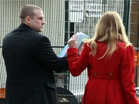 Chad Landriault, left, leaves Ontario Court of Justice in Windsor with defence lawyer Lisa Carnelos, February 27, 2017.