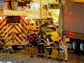 Emergency responders work at the scene of a multi-vehicle collision on Herb Gray Parkway near Cabana Road on Feb. 7, 2017.