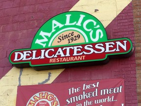The Malic's Deli sign is shown on Feb. 9, 2017. Malic's Deli continues to serve the same corned beef and pastrami sandwiches like they did when the Wyandotte Street East restaurant opened in 1929.