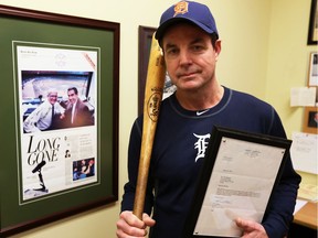 Tom Marshall has great respect for Mike Ilitch, the late owner of Detroit Tigers and Detroit Red Wings. With written permission from Ilitch, Marshall was allowed to take batting practice with the Tigers, a memory he will cherish forever. In this Feb. 14, 2017 photo, Marshall holds the framed letter from Ilitch's office and the bat he used at batting practice.