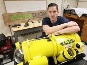 Ryan Cant, founder and CEO of Envirodrone, is shown at his University of Windsor workshop on Feb. 21, 2017. Cant and his team are developing an autonomous underwater vehicle and have been selected to compete in the Shell Ocean Discovery XPrize. The remotely operated Sea Otter, shown, is used for testing sensors Cant develops.