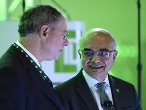 President and CEO Bharat Masrani, right, and Chairman of the Board Brian Levitt speak at the TD Bank Group annual general meeting in Toronto on Thursday, March 30, 2017. THE CANADIAN PRESS/Frank Gunn