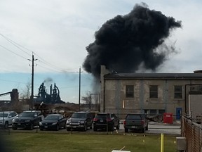 A plume of black smoke billows from U.S. Steel in this handout photo.