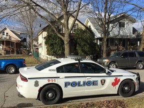 A Windsor police cruiser sits outside 1191 Albert Rd. on March 2, 2017. Police investigated the address after receiving reports of shots fired there the night before.