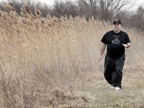 Walker Keith Hawkins cruises around Libro Centre football field and surrounding fields on Feb. 28, 2017. Hawkins enjoys walks in his neighbourhood, but also walks along trails, tracks and back country.