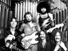 Former Boston drummer Sib Hashian, top in photo, has died after collapsing on stage. Doctors were unable to revive the 67-year-old rocker, real name John Thomas Hashian, after he collapsed on March 22, 2017, while performing on a ship taking tourists on a Caribbean cruise. The group's original lineup, above included Tom Scholz, left, Fran Sheehan, Barry Goudreau and Brad Delp.