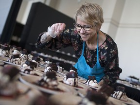 Michele Bowman, owner of the Little White Kitchen puts the finishing touches on her chocolate strawberry pavlova desserts on display at the 19th Annual Chocolate Lovers Brunch at the St. Clair Centre for the Arts, Sunday, March 5, 2017.  All proceeds raised support VON Windsor-Essex.